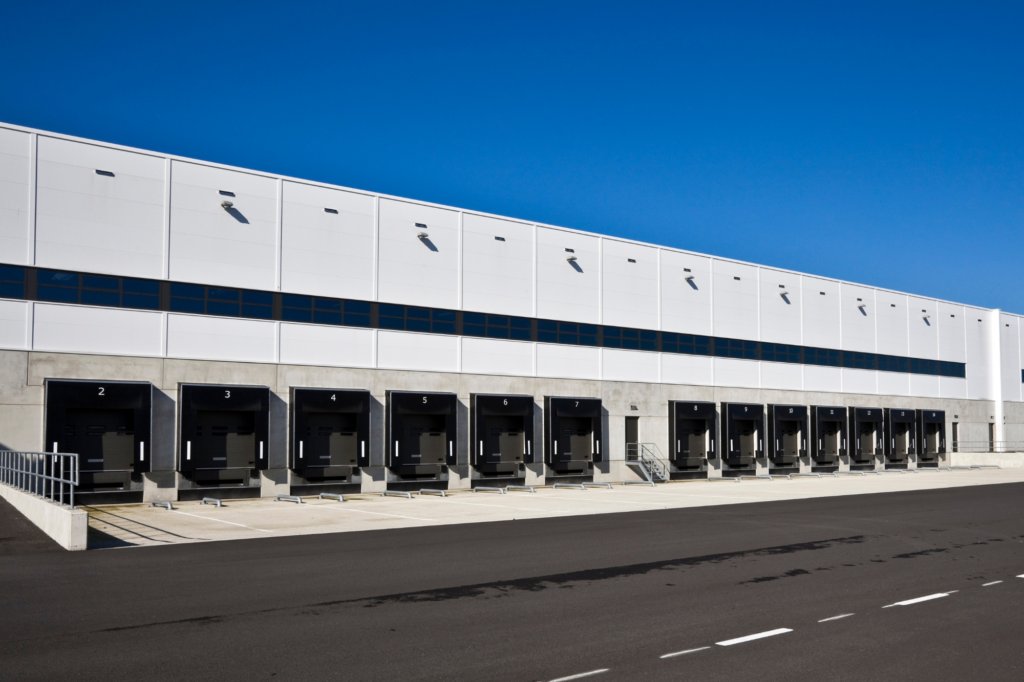 An industrial property with machinery and production lines.