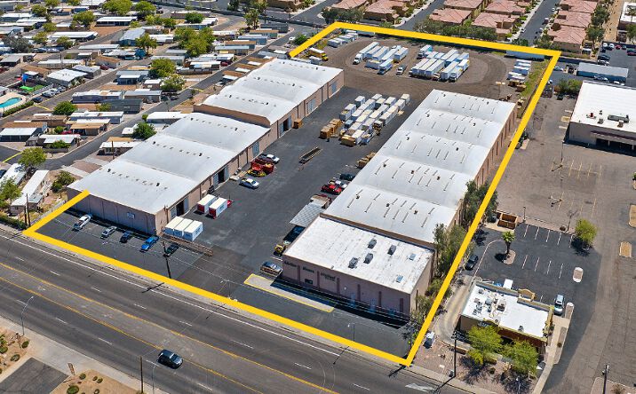 A large warehouse with loading docks and storage racks.